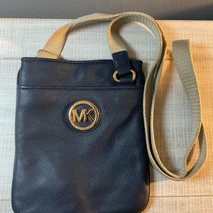 Michael Kors Crossbody purse.